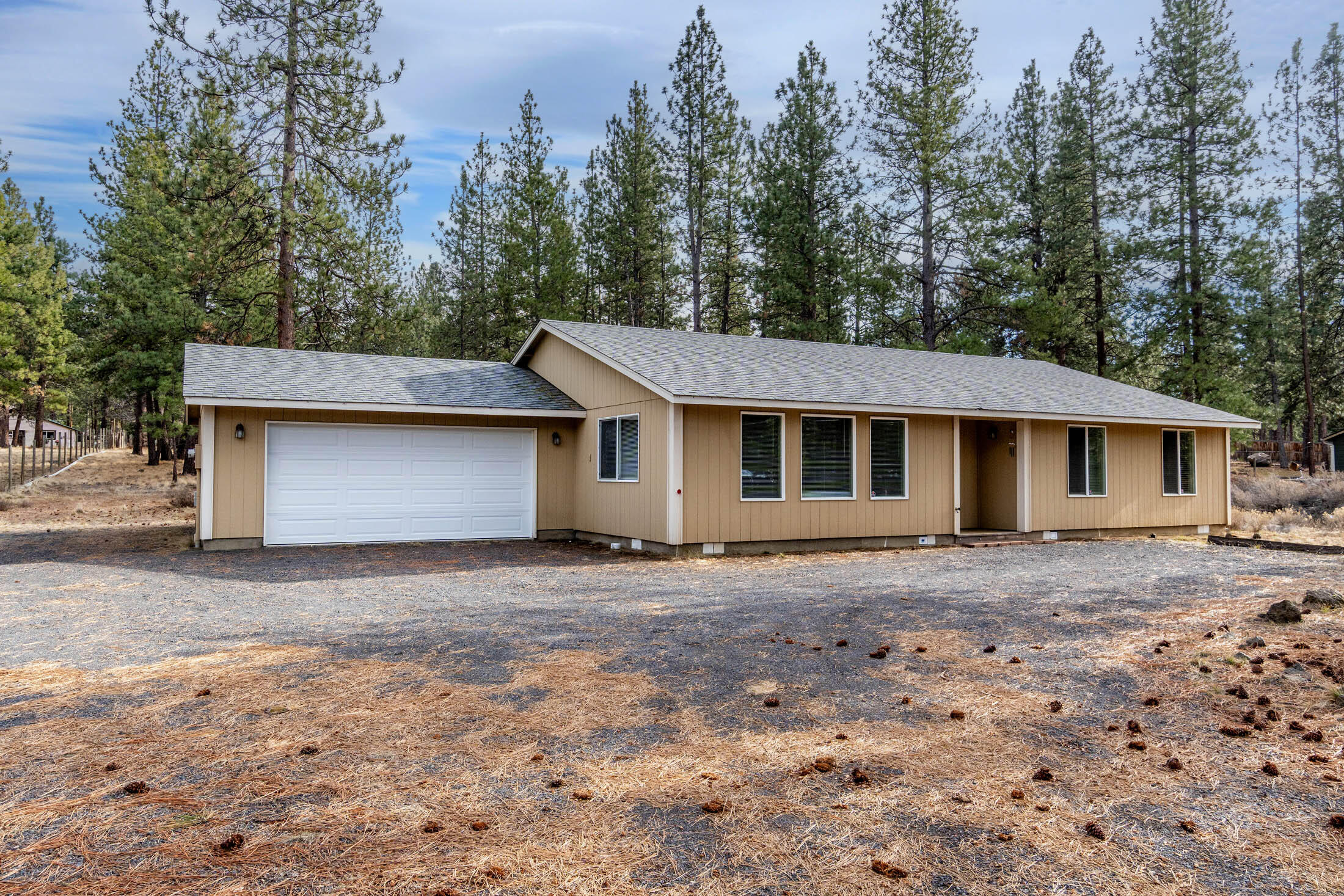 60196 Navajo Road Bend, OR 97702 - Photo 20 of 23 The driveway is gravel, and can be extended around the left end to the back part of the property.