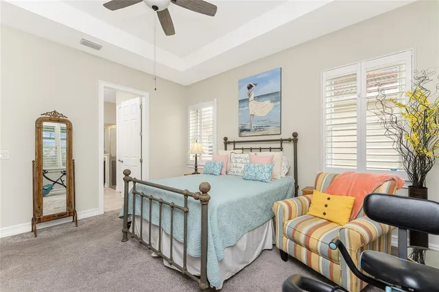 a view of a swimming pool with an outdoor seating