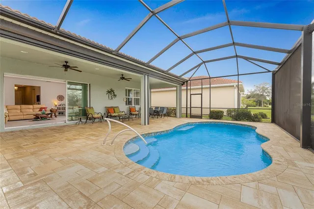 a view of outdoor space with playground and green space