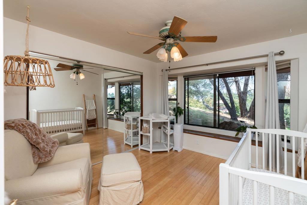 315 Alpine Heights Road Alpine, CA 91901 - Photo 21 of 42 a living room with furniture and a large window