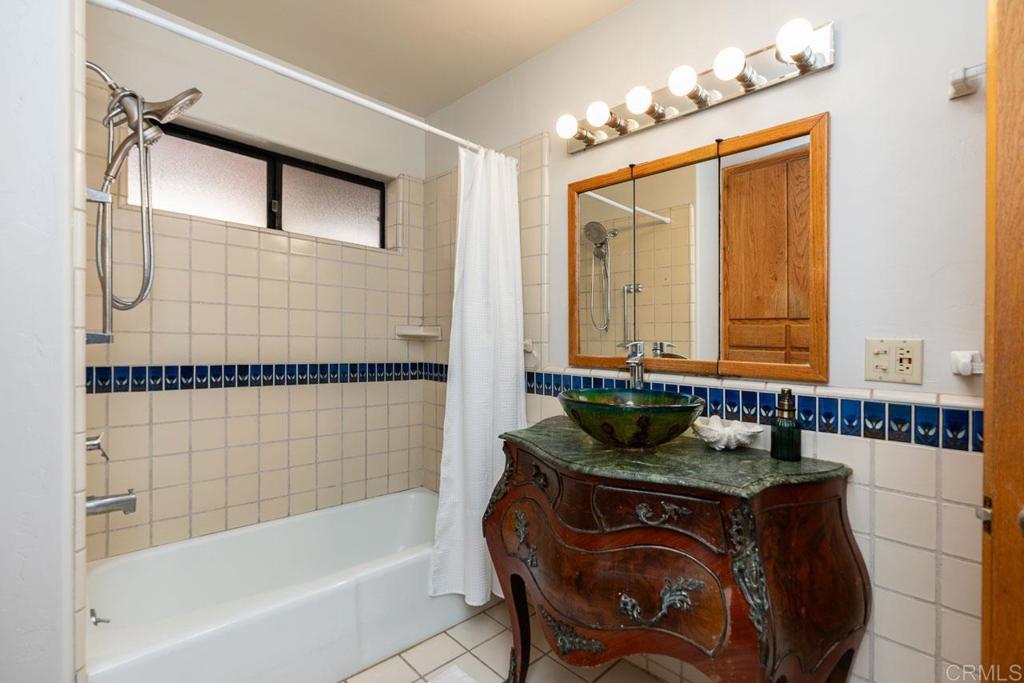 315 Alpine Heights Road Alpine, CA 91901 - Photo 23 of 42 a bathroom with a bathtub and a shower
