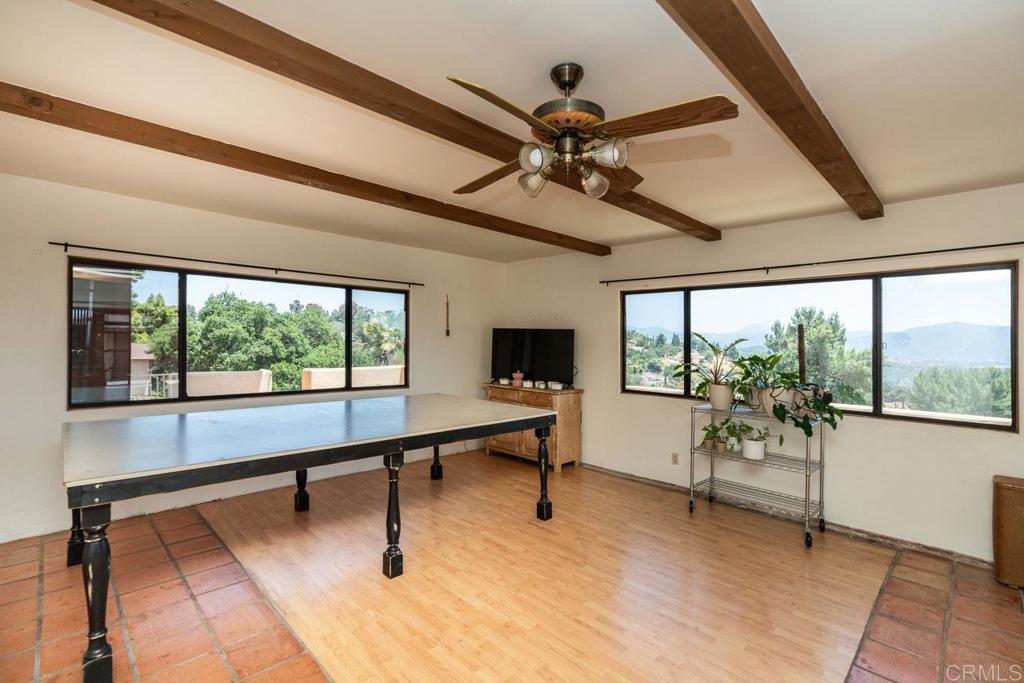 315 Alpine Heights Road Alpine, CA 91901 - Photo 27 of 42 a living room with furniture and a large window