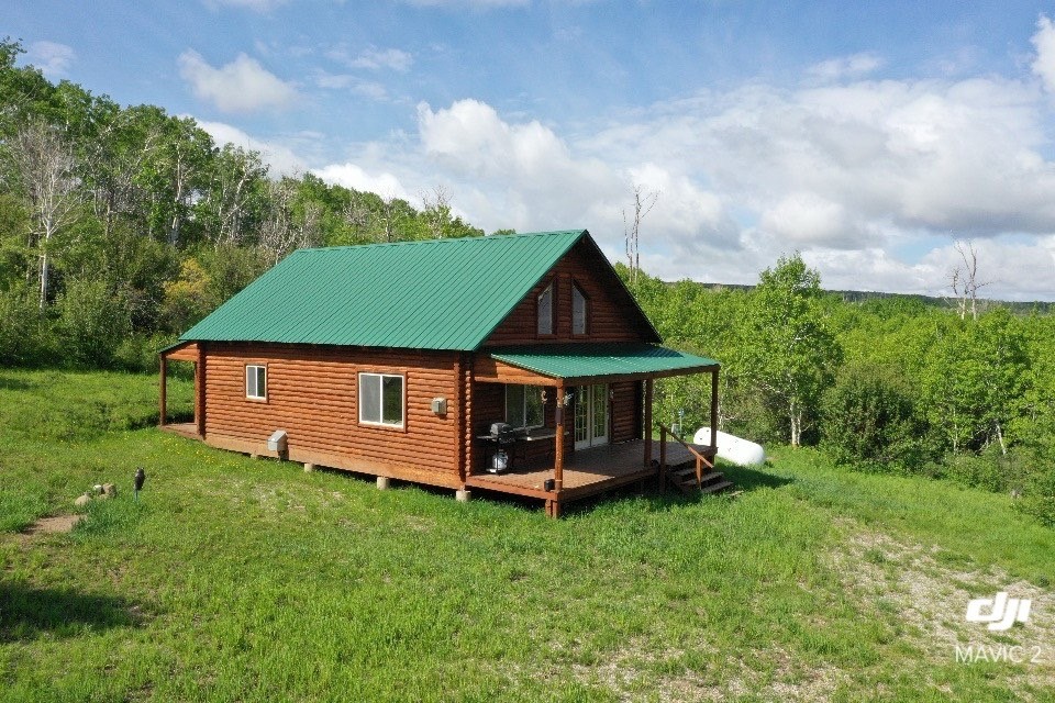 80 Sapling Lane Craig, CO 81625 - Photo 2 of 20 an aerial view of a house with garden