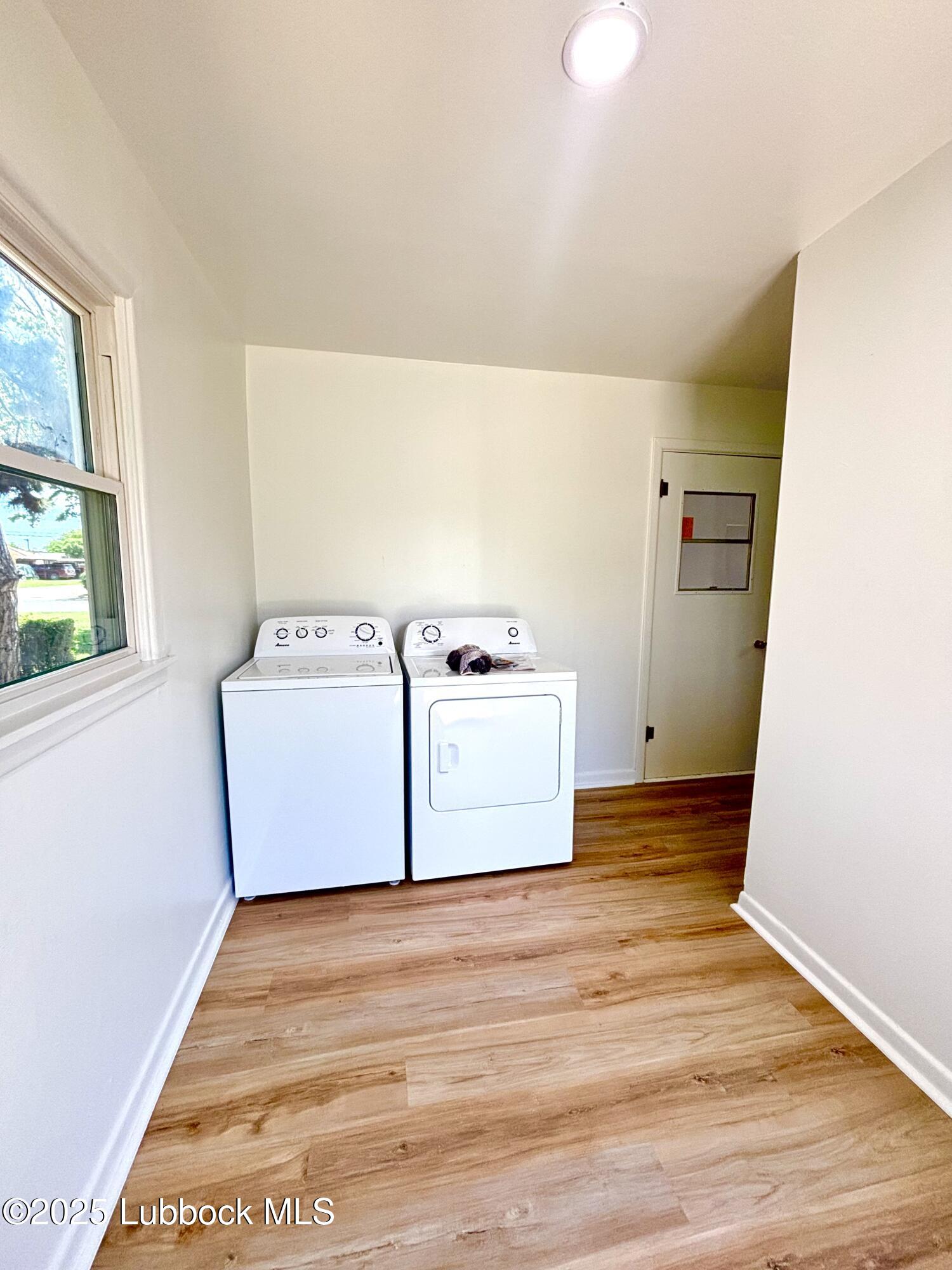 815 Amarillo Plainview, TX 79072 - Photo 15 of 17 a utility room with washer and dryer