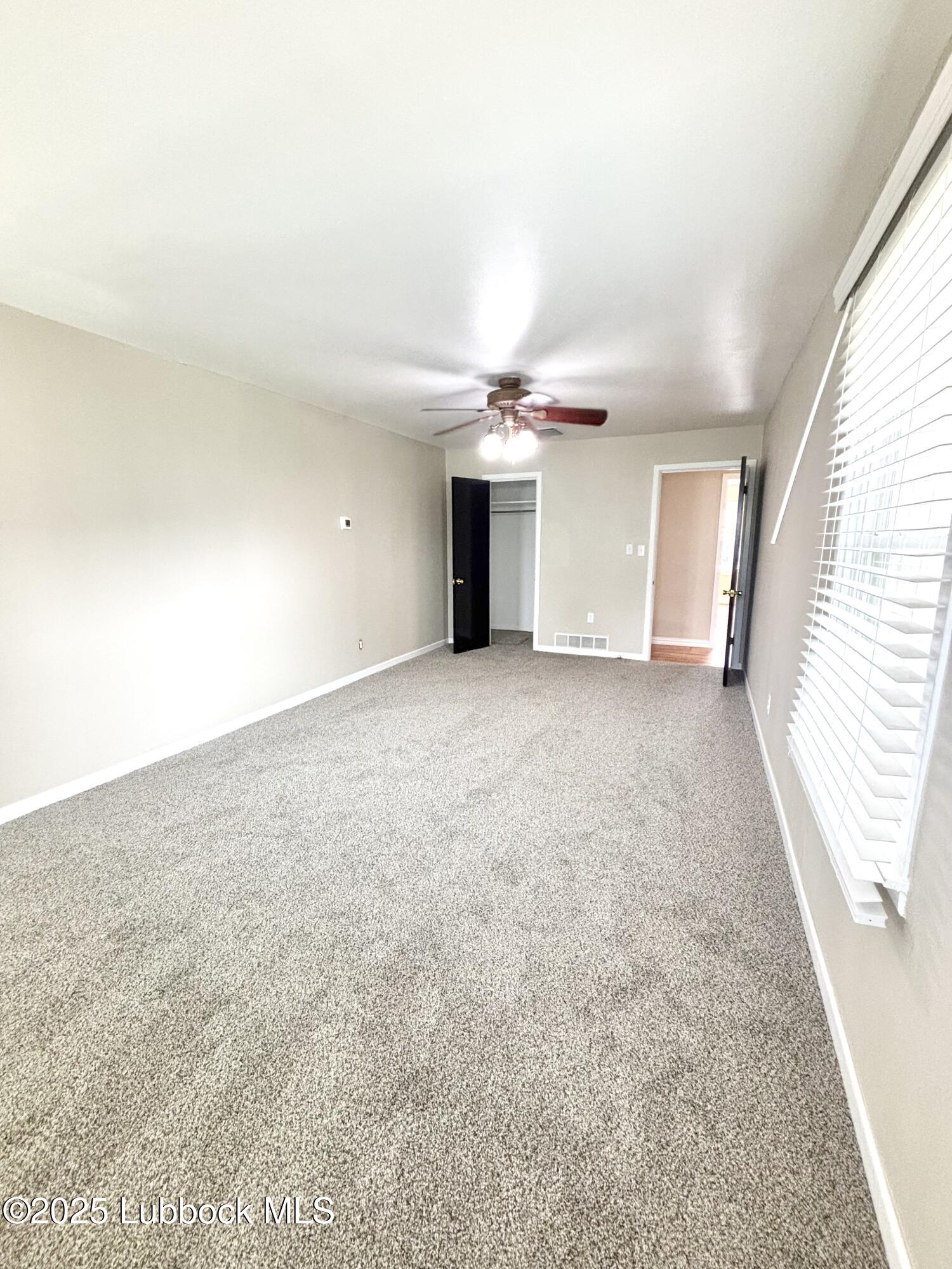 815 Amarillo Plainview, TX 79072 - Photo 7 of 17 a view of a livingroom with a staircase