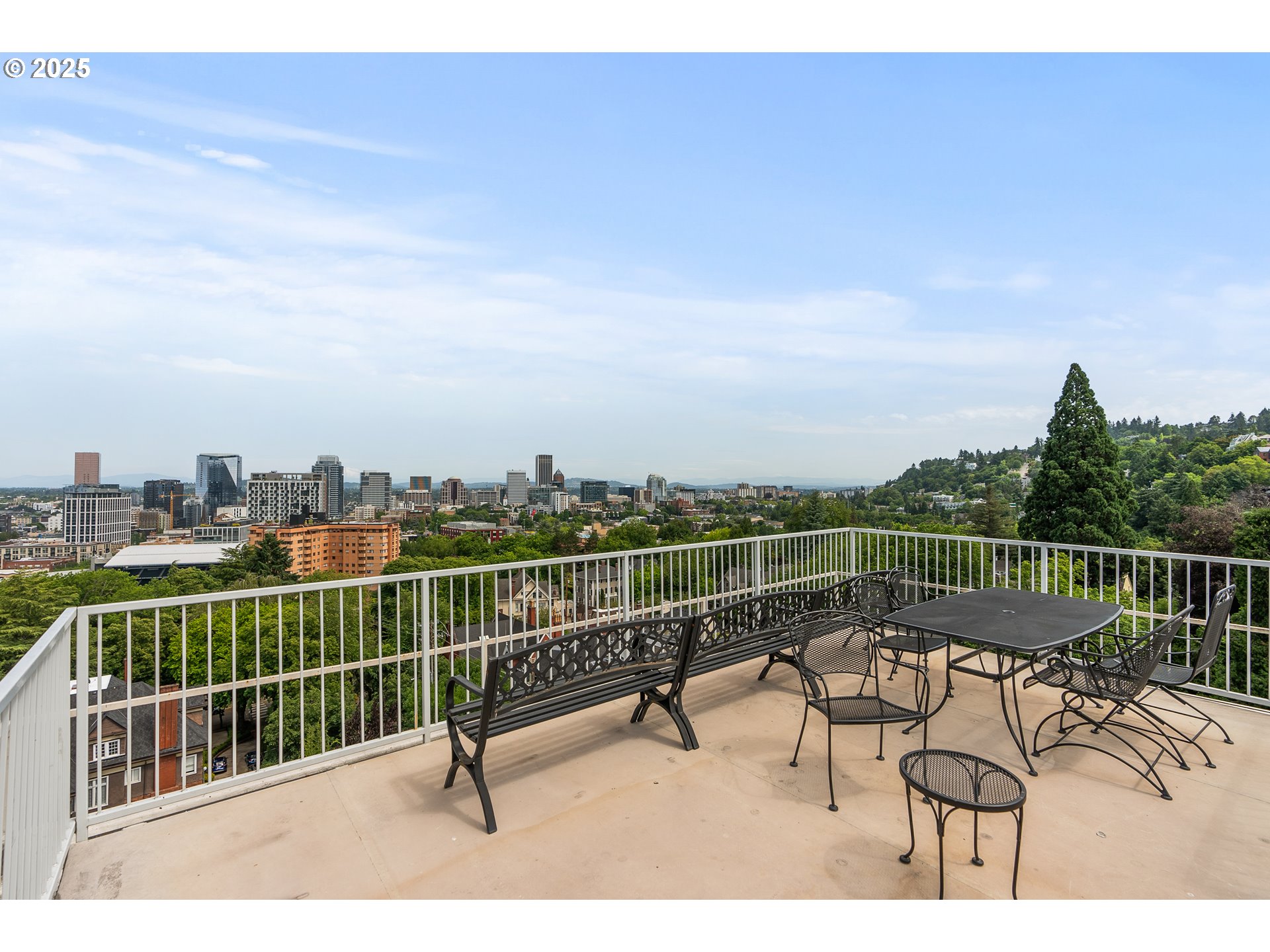 2211 Southwest Park Place, Unit 903 Portland, OR 97205 - Photo 24 of 34 a view of a roof deck with furniture