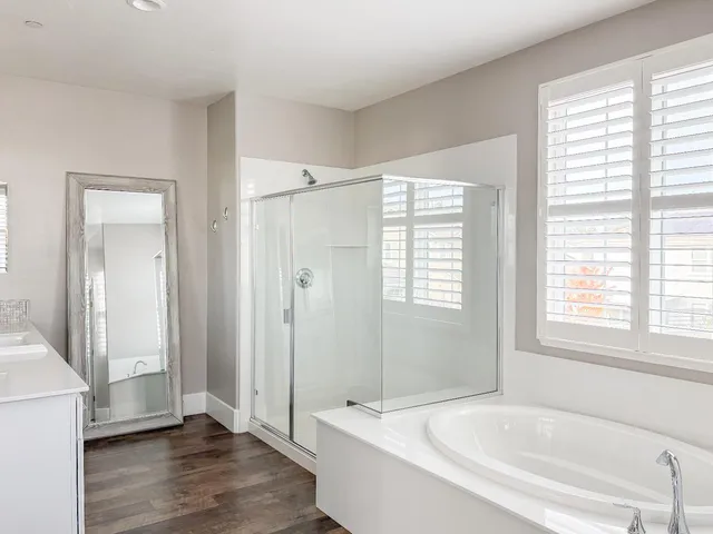 a bathroom with sink and mirror