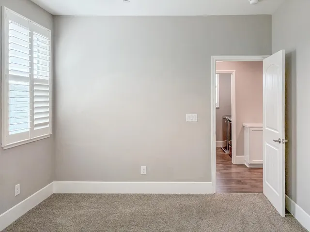 a bathroom with a toilet and a bathtub