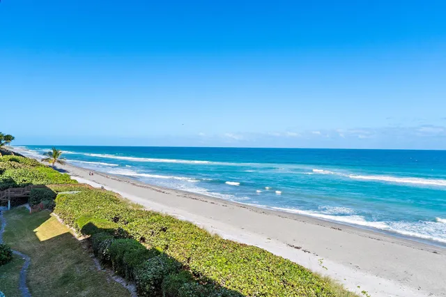 a bathroom with a sink a mirror and vanity