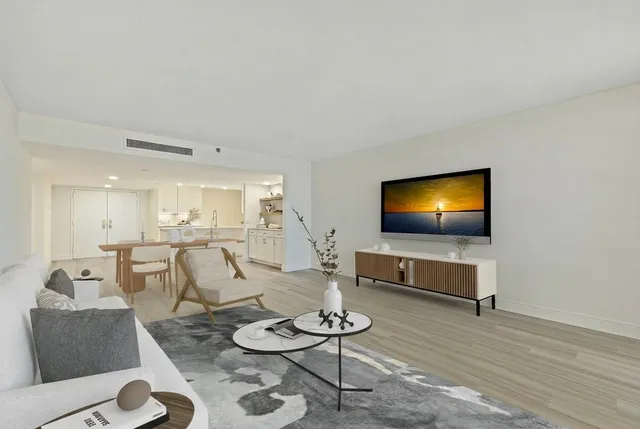 a bedroom with a bed and a mirror