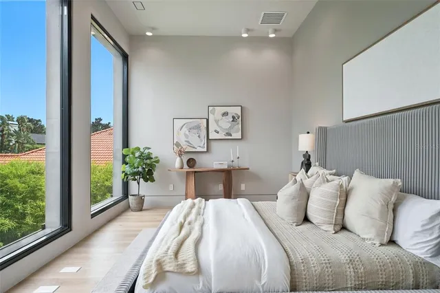 a living room with furniture rug and window