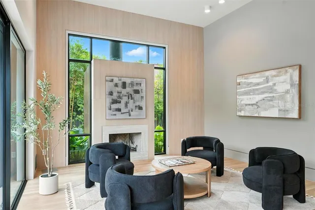 a view of a chairs and table in the balcony