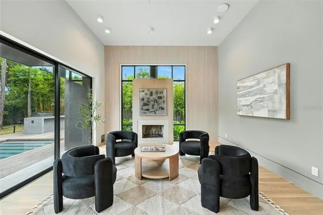 a view of a chairs and table on the wooden floor
