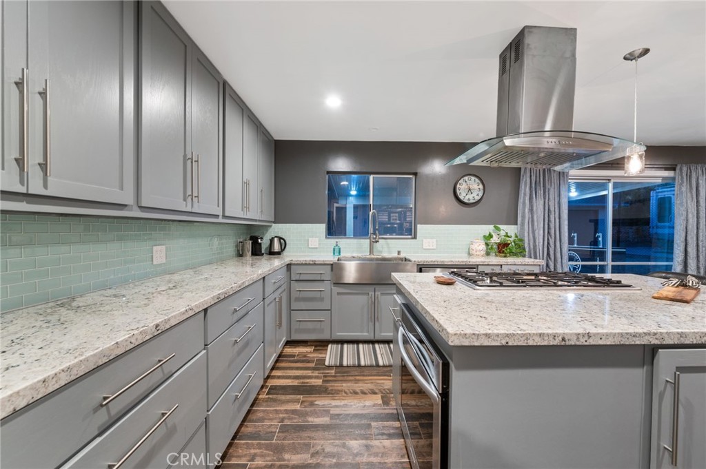 40040 Ross Road Fallbrook, CA 92028 - Photo 11 of 27 a kitchen with a stove oven and cabinets