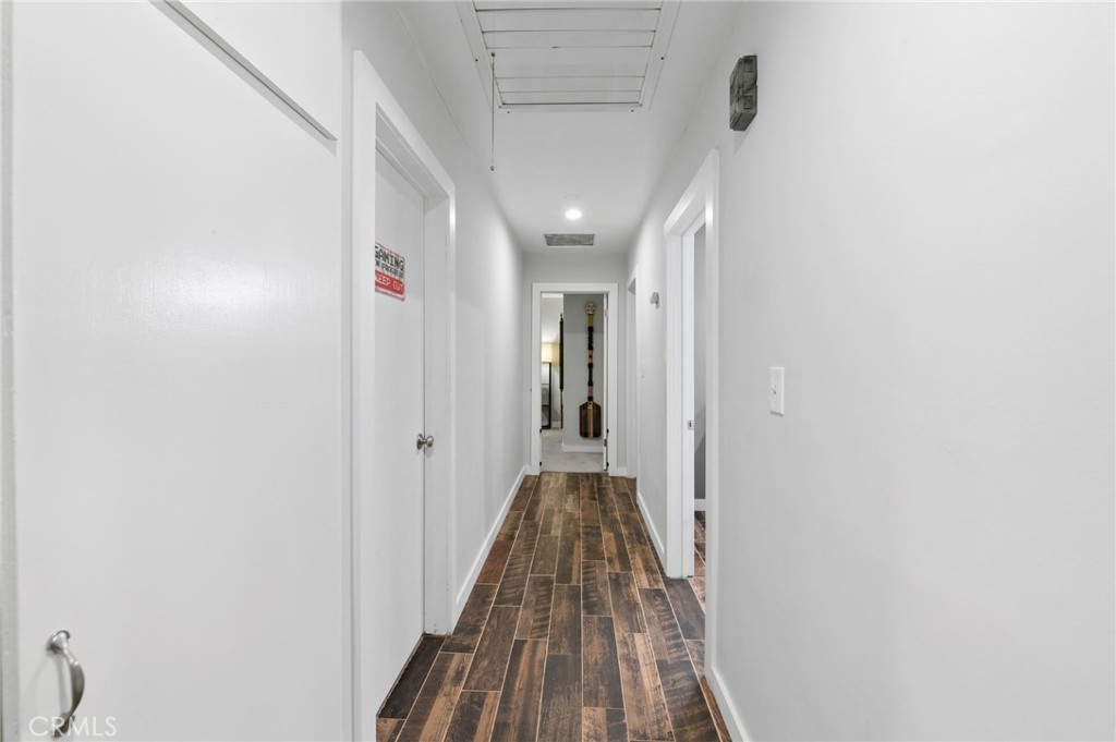 40040 Ross Road Fallbrook, CA 92028 - Photo 14 of 27 a view of a hallway with wooden floor and staircase