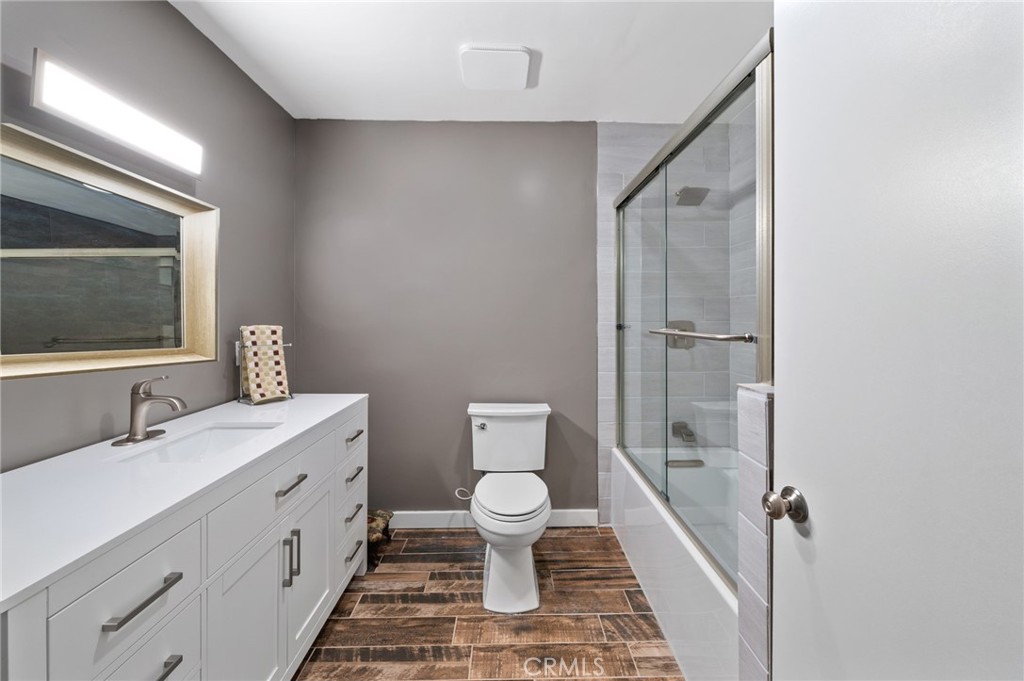 40040 Ross Road Fallbrook, CA 92028 - Photo 19 of 27 a bathroom with a toilet sink and a mirror