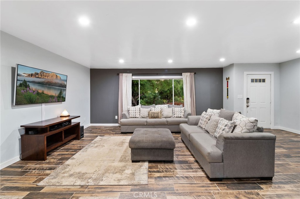 40040 Ross Road Fallbrook, CA 92028 - Photo 5 of 27 a living room with furniture and a flat screen tv