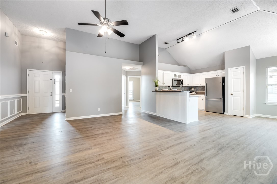 10 Vineyard Haven Drive Pooler, GA 31322 - Photo 7 of 28 Looking from fireplace to kitchen.