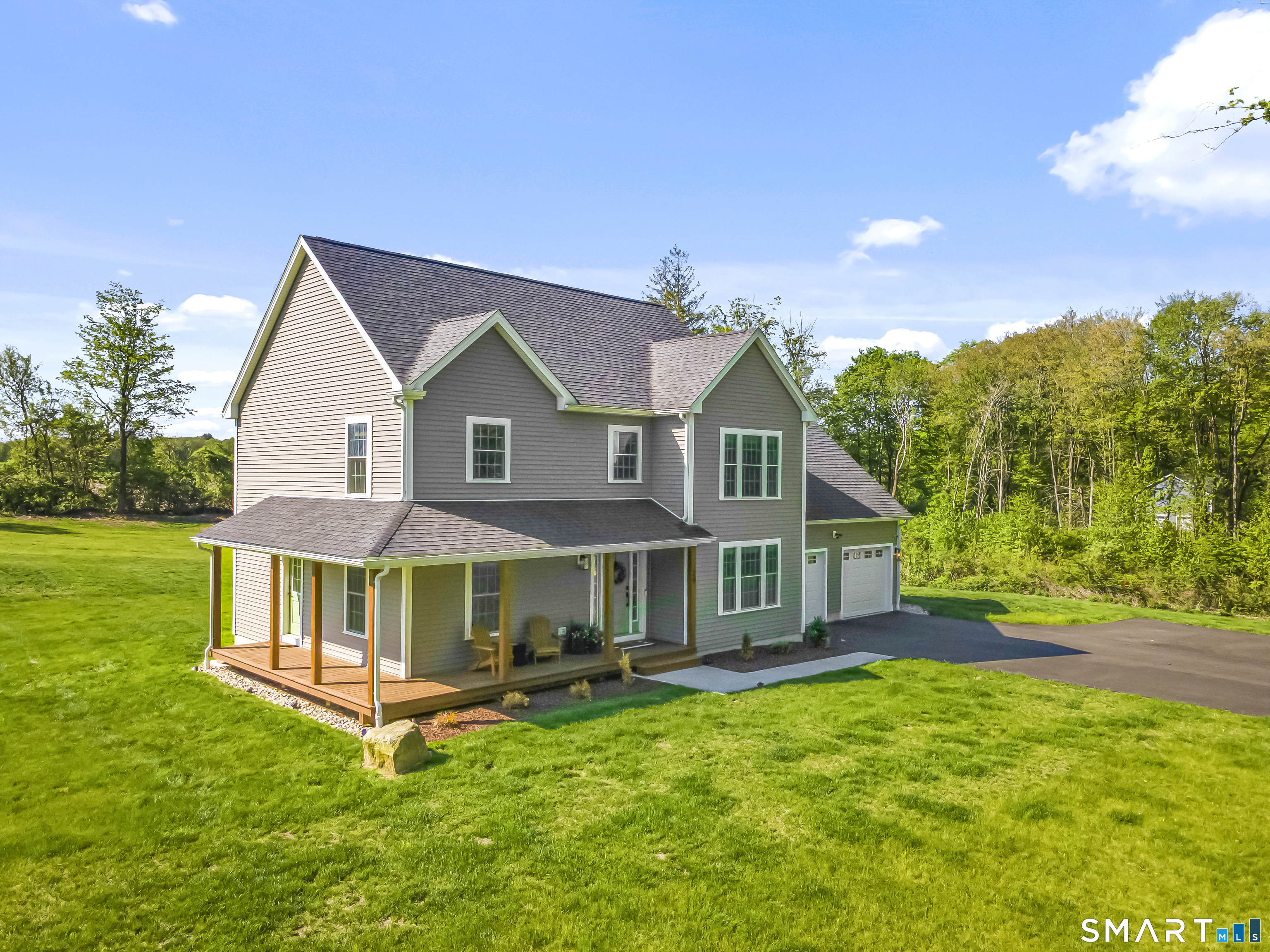 29 Beecher Road Brooklyn, CT 06234 - Photo 2 of 40 a view of a house with a yard