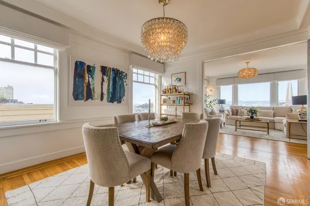 a view of a dining room with furniture window and outside view
