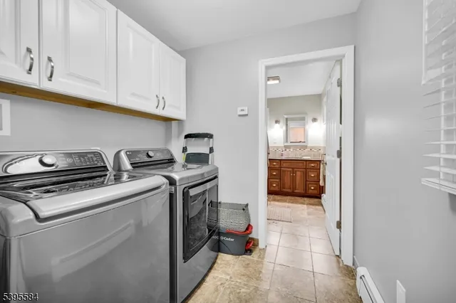 a view of kitchen with washer and dryer