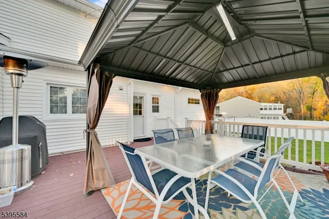 a outdoor dining space with furniture