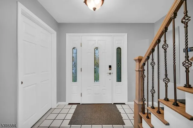 a view of an entryway with a rug