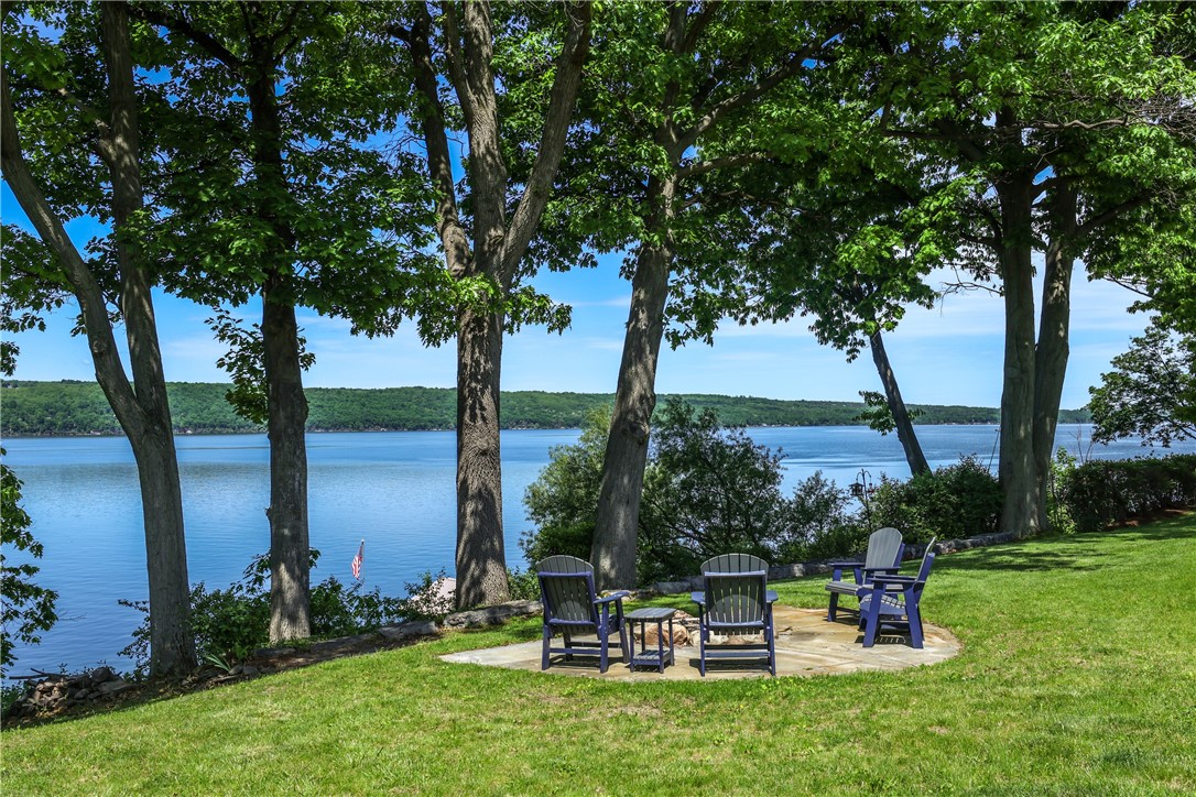 5580 Peach Orchard Road Hector, NY 14841 - Photo 15 of 50 Natural stone fire pit overlooking the lake