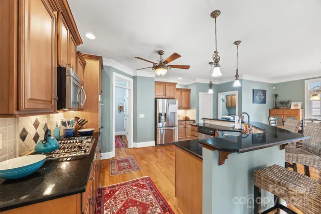 a view of a living room and dining room