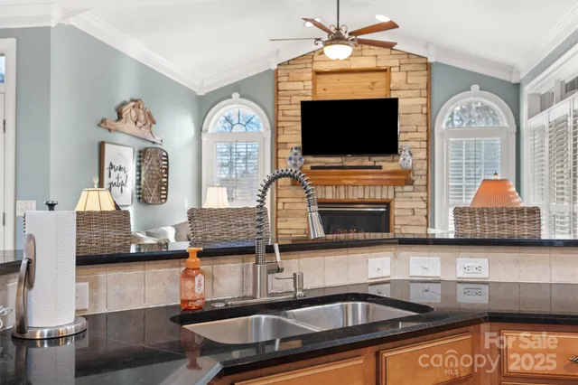 a room with fireplace and flat screen tv