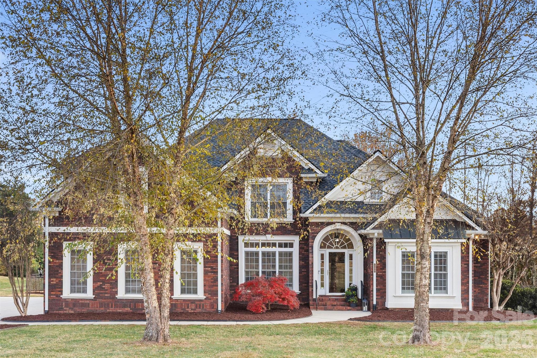 1177 Springlake Road York, SC 29745 - Photo 2 of 48 a front view of a house with a garden