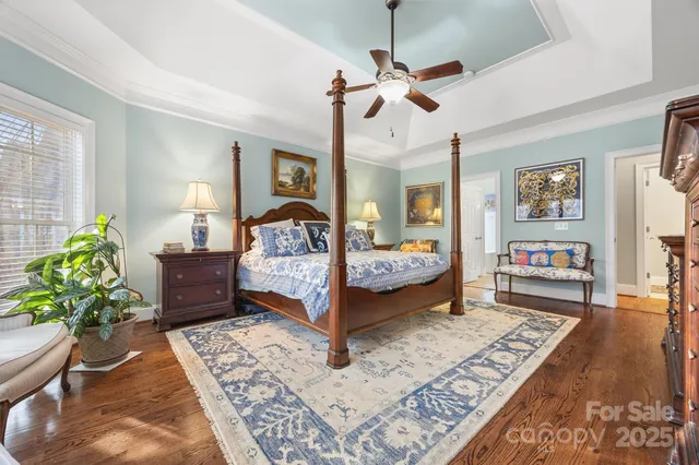 a bedroom with furniture and a bed