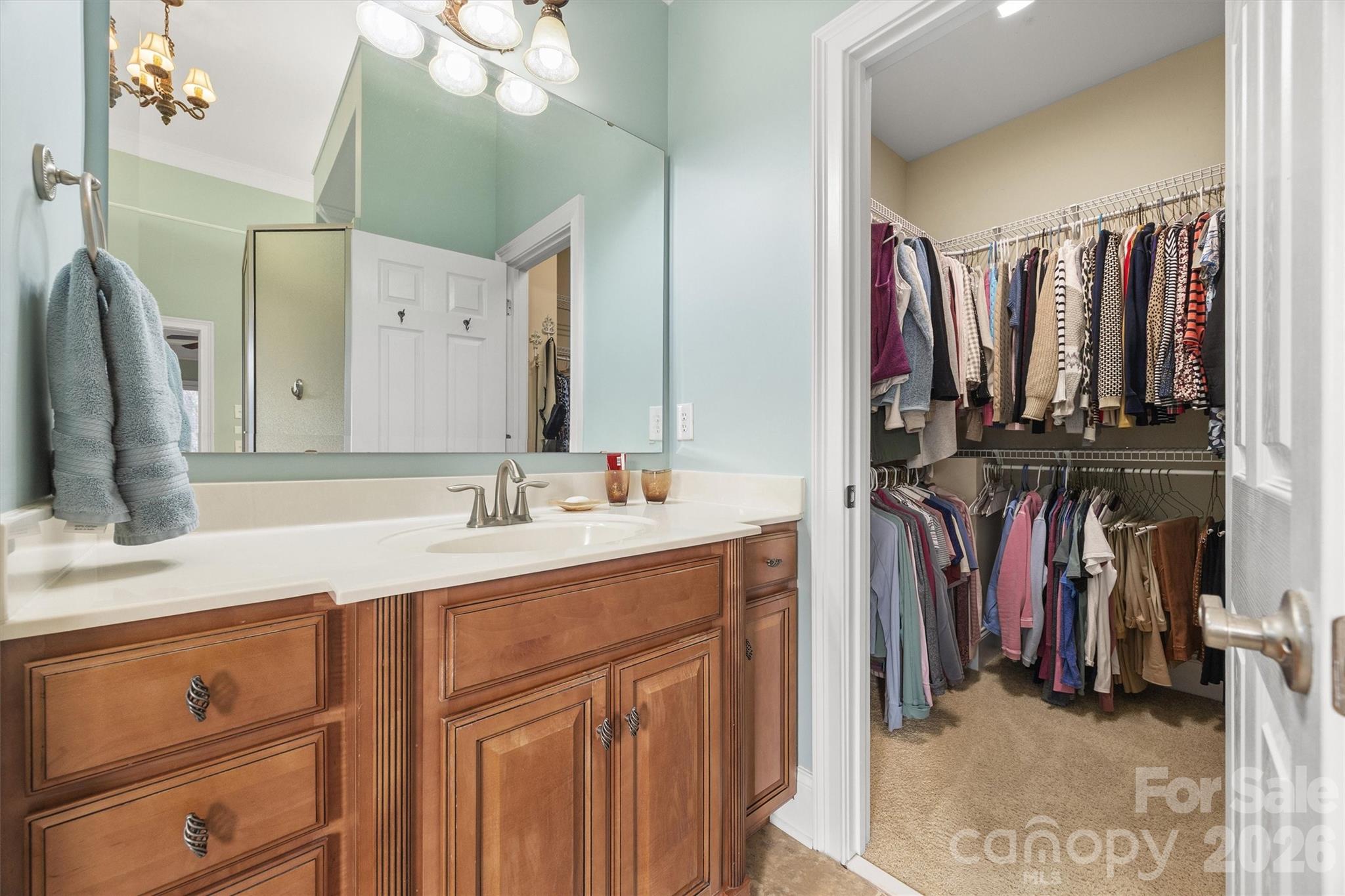 1177 Springlake Road York, SC 29745 - Photo 25 of 48 a view of walk in closet with clothes