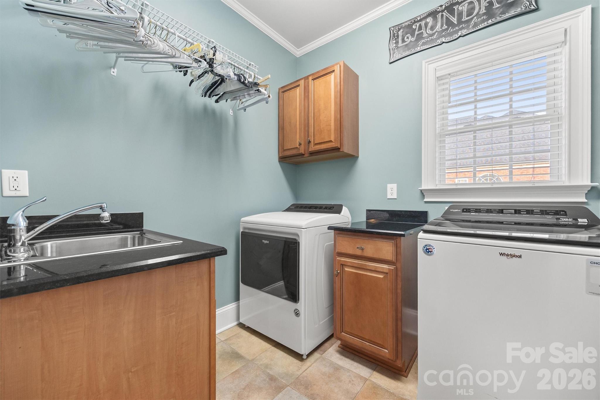 1177 Springlake Road York, SC 29745 - Photo 27 of 48 a utility room with sink dryer and washer