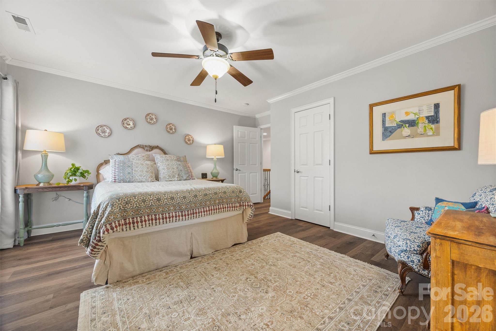 1177 Springlake Road York, SC 29745 - Photo 34 of 48 a bedroom with a bed and a chandelier