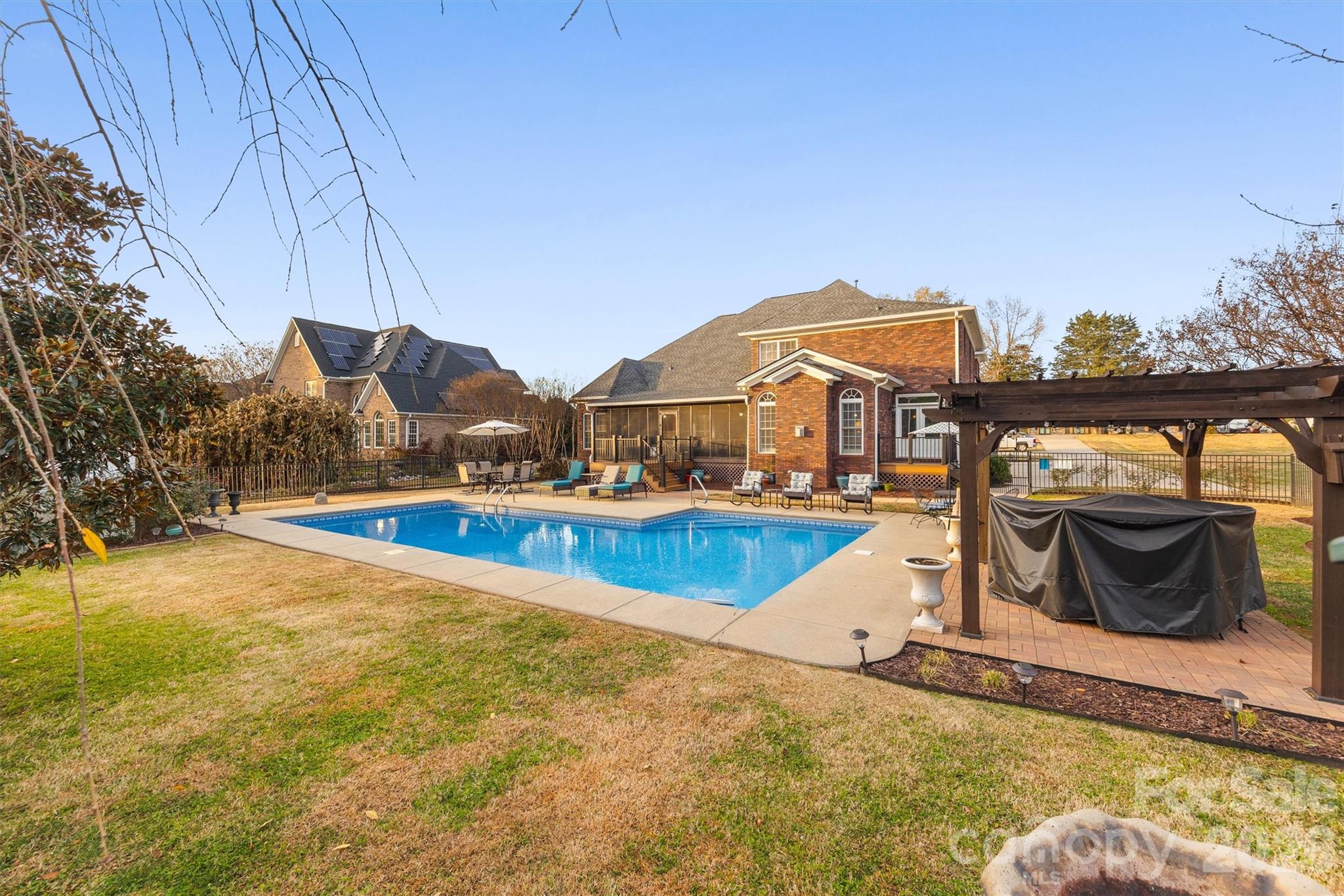 1177 Springlake Road York, SC 29745 - Photo 41 of 48 a view of a swimming pool with a lounge chairs