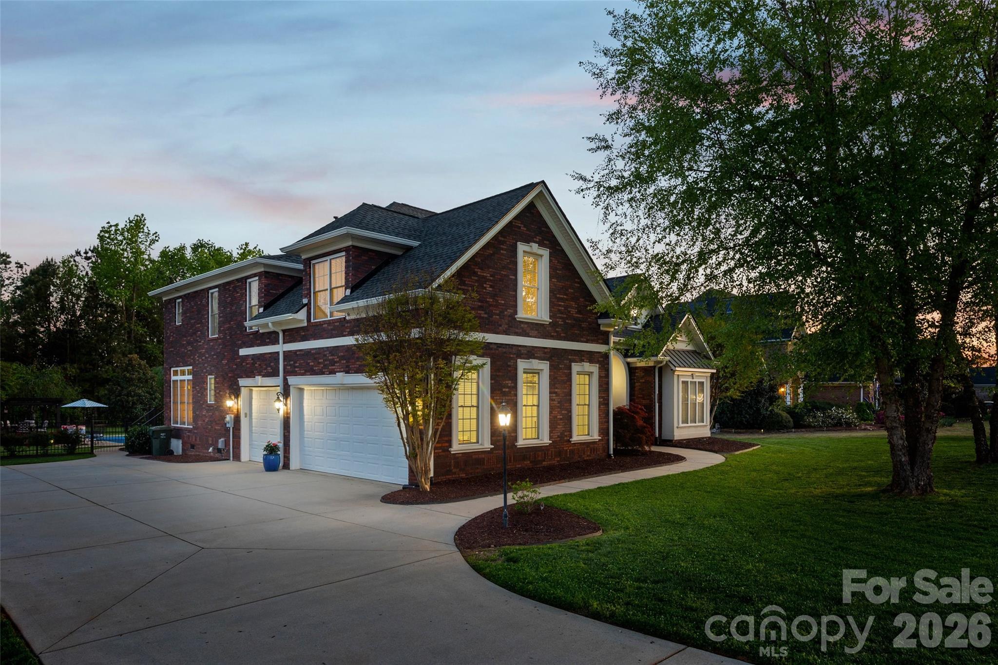 1177 Springlake Road York, SC 29745 - Photo 43 of 48 a front view of a house with a garden