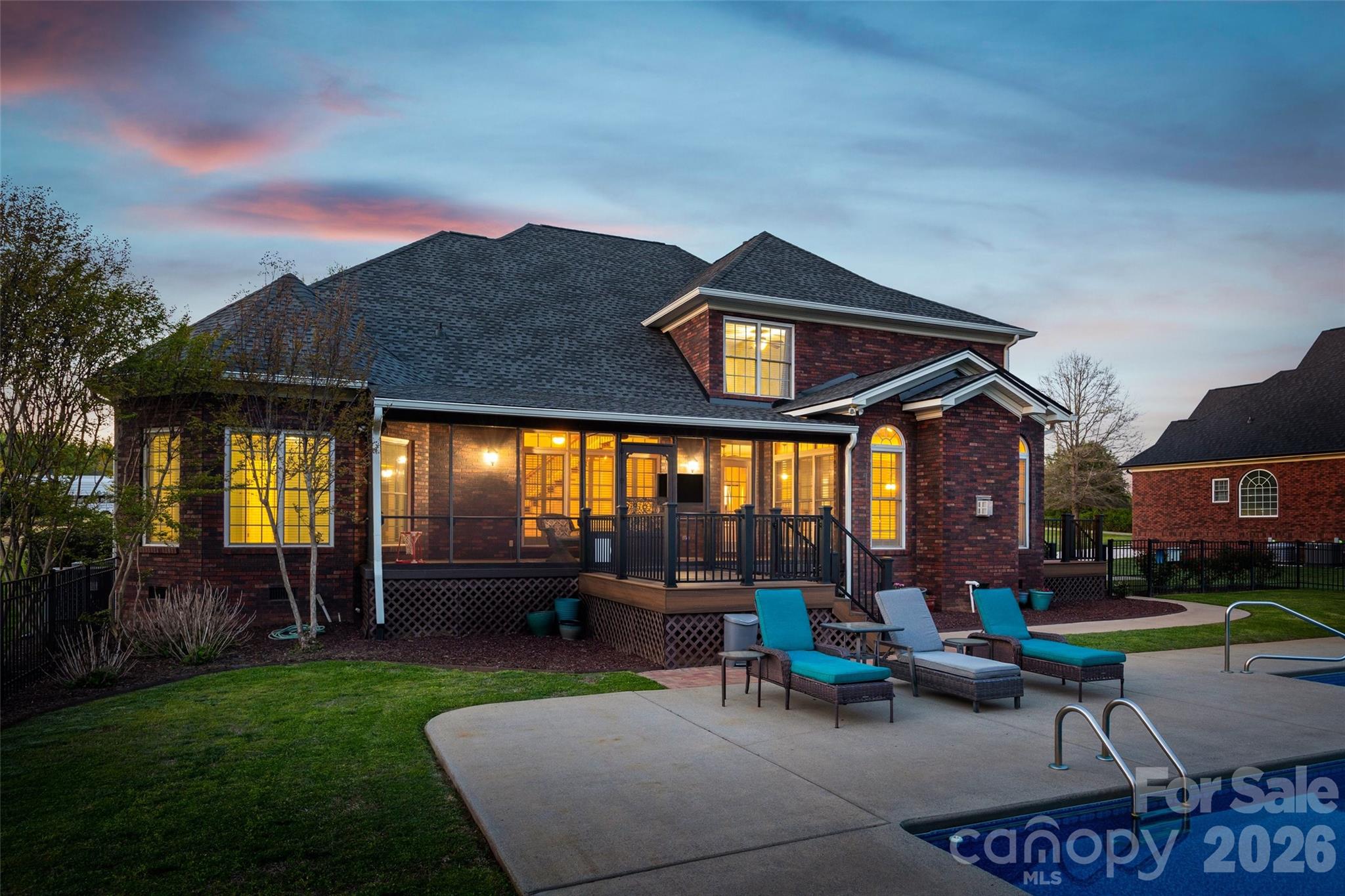 1177 Springlake Road York, SC 29745 - Photo 45 of 48 a view of a patio with couches table and chairs and potted plants