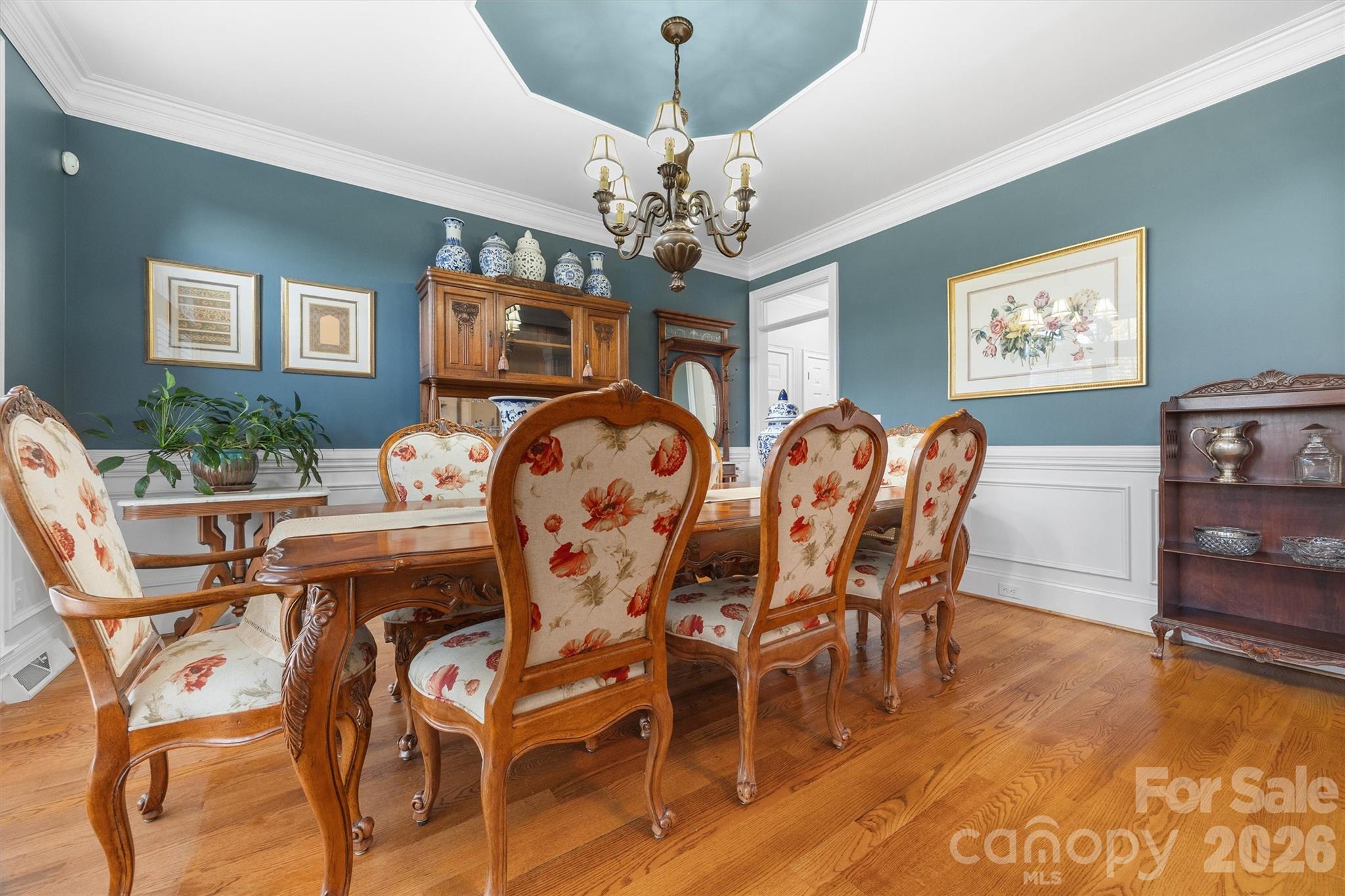1177 Springlake Road York, SC 29745 - Photo 5 of 48 a view of a dining room with furniture and chandelier
