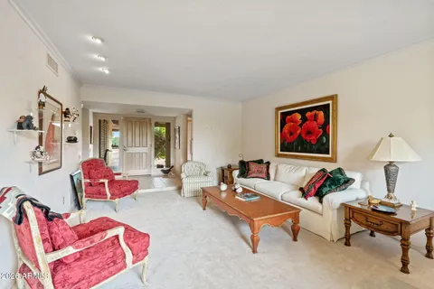 a living room with furniture and a couch