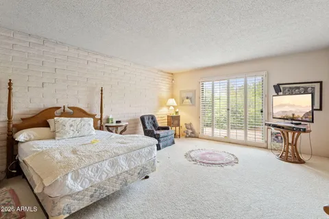 a workspace with furniture and a window