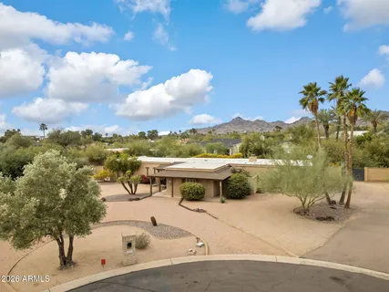 a view of a terrace with a lake view