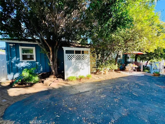 a front view of a house having yard