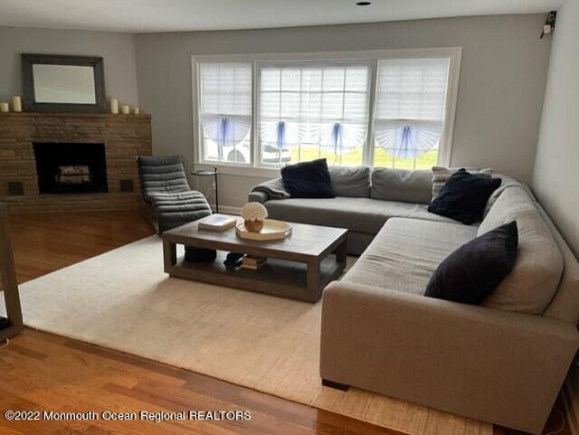 22 Robin Road Rumson, NJ 07760 - Photo 2 of 12 a living room with furniture and a fireplace