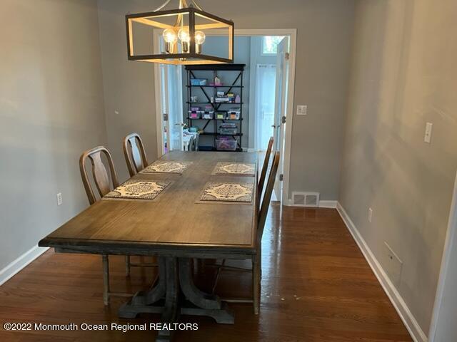 22 Robin Road Rumson, NJ 07760 - Photo 3 of 12 a view of a dining room with furniture and wooden floor