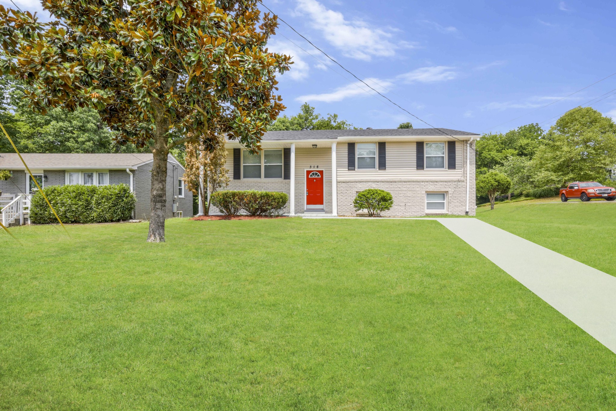 318 Bonnahurst Drive Hermitage, TN 37076 - Photo 1 of 30 a front view of house with yard and green space