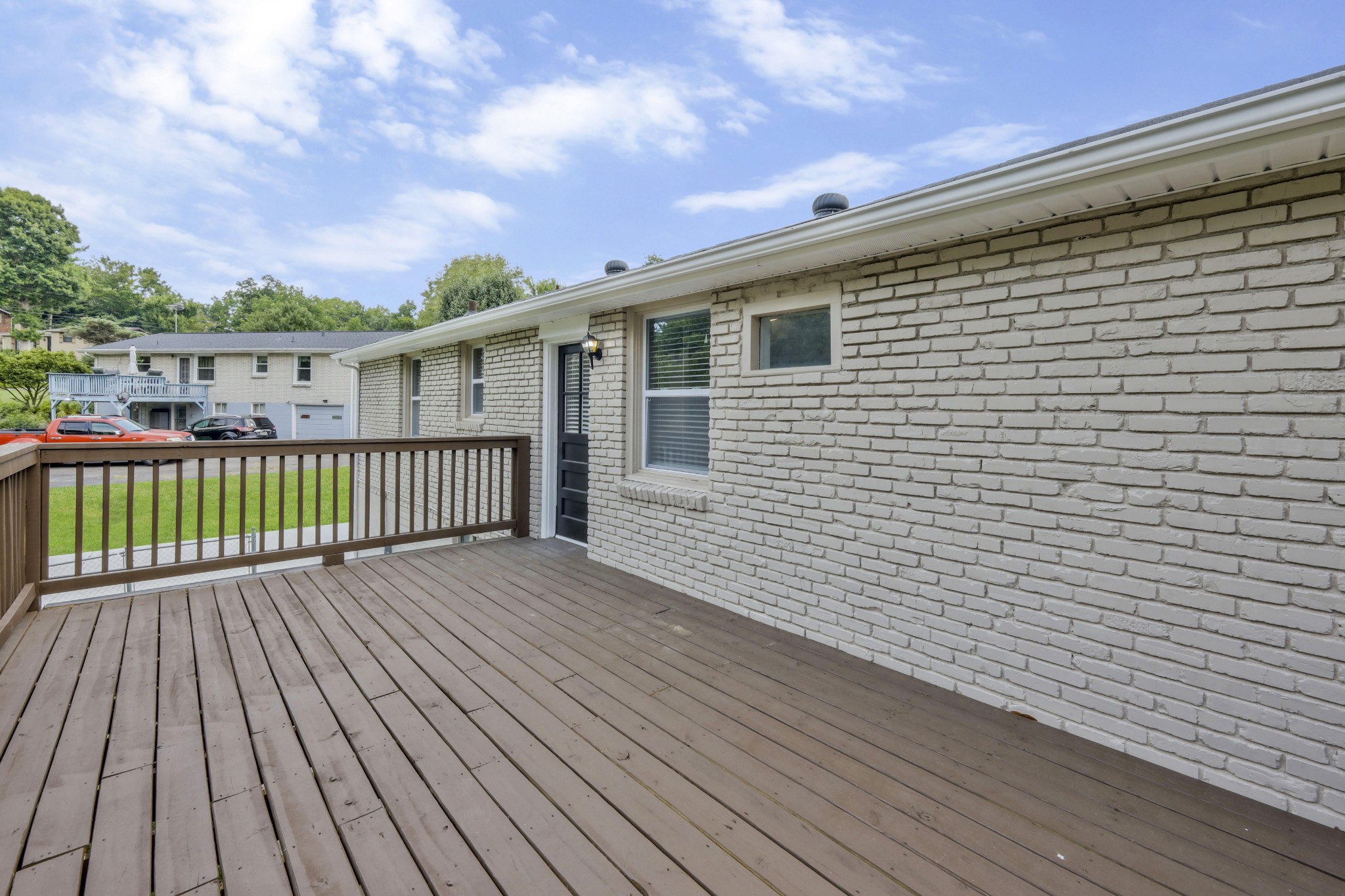 318 Bonnahurst Drive Hermitage, TN 37076 - Photo 12 of 30 a view of a wooden deck with a yard