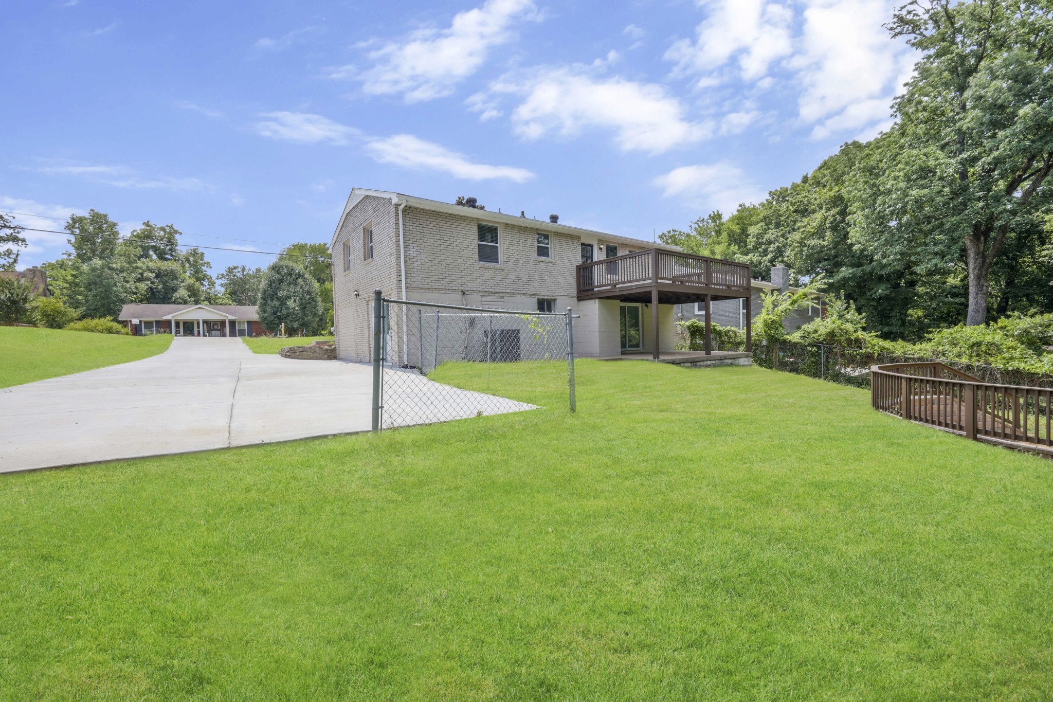 318 Bonnahurst Drive Hermitage, TN 37076 - Photo 13 of 30 a view of a house with swimming pool and a yard