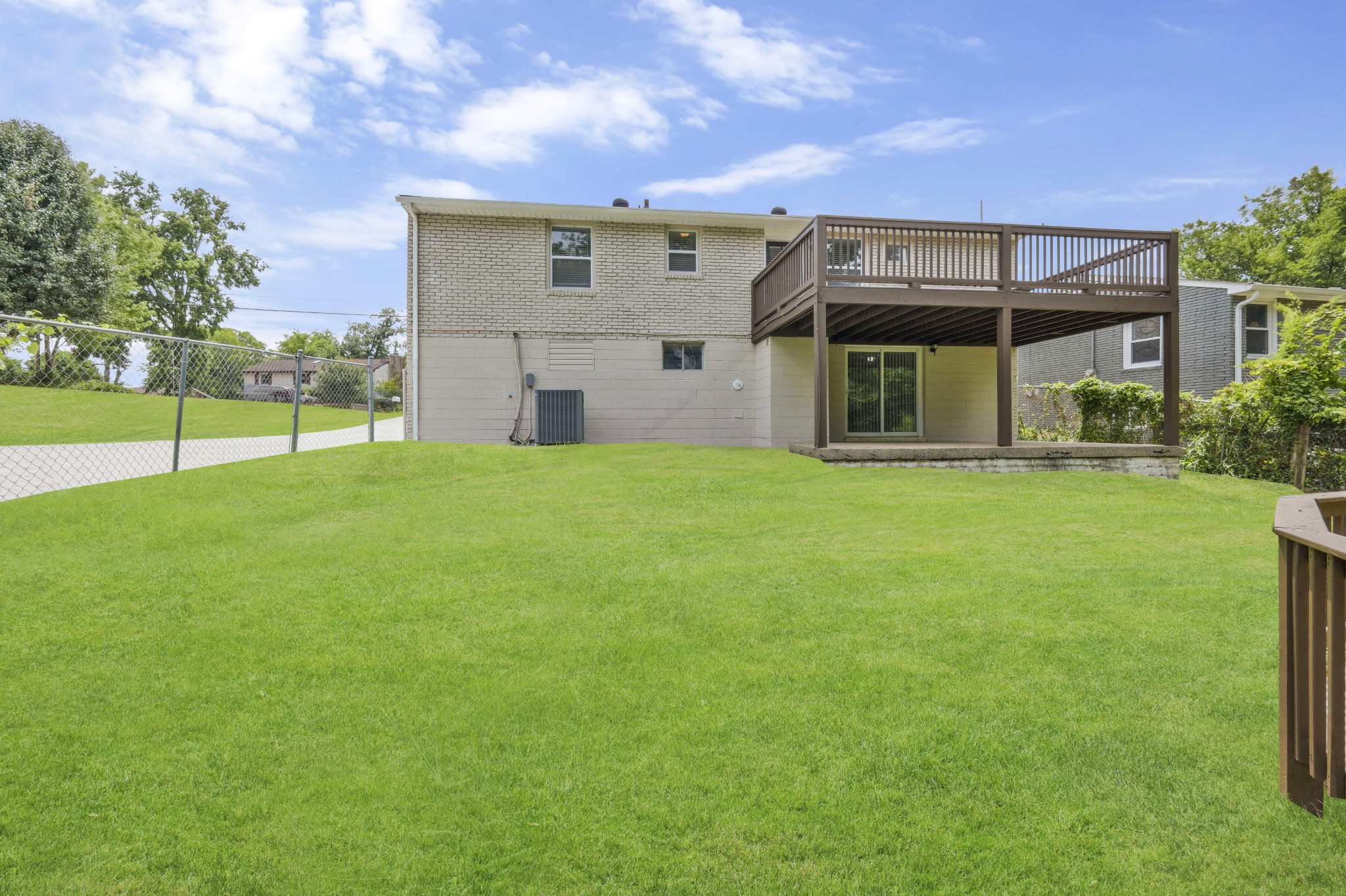 318 Bonnahurst Drive Hermitage, TN 37076 - Photo 14 of 30 a view of a house with a yard and a large tree