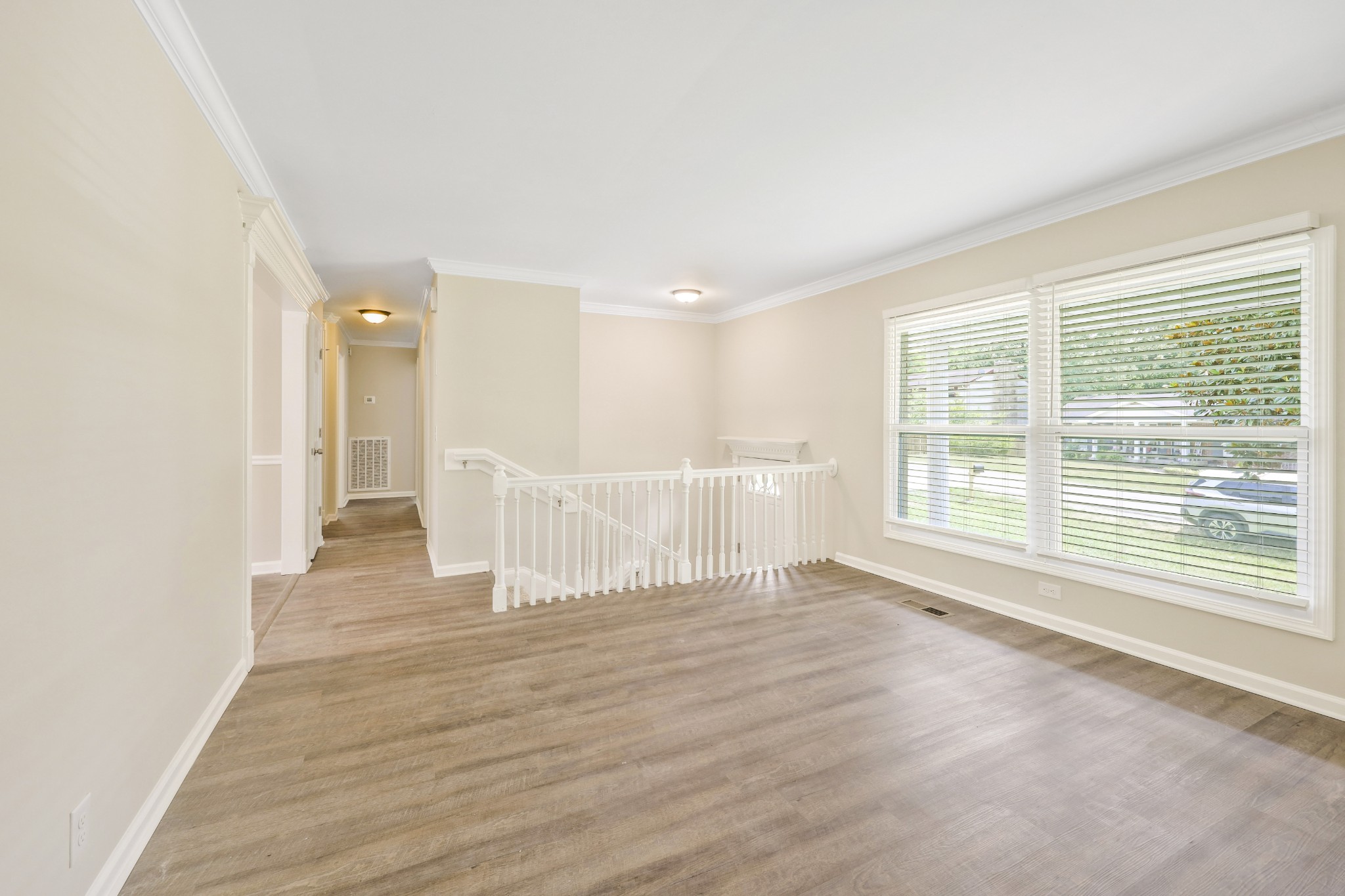 318 Bonnahurst Drive Hermitage, TN 37076 - Photo 18 of 30 a view of an empty room with wooden floor and a window
